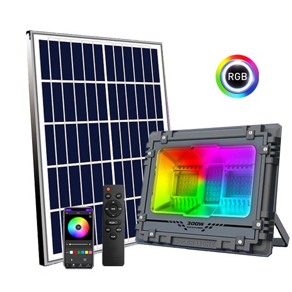 Carton / Lot de 4x Projecteurs LED solaires - Série WARRIOR RGBW (Multicolores + Blanc) - 300 Watts - Angle 120° - Lampe 34 x 27 x 8 cm - IP67 - Avec télécommande - Avec capteur crépusculaire - Bluetooth - Rythme musical