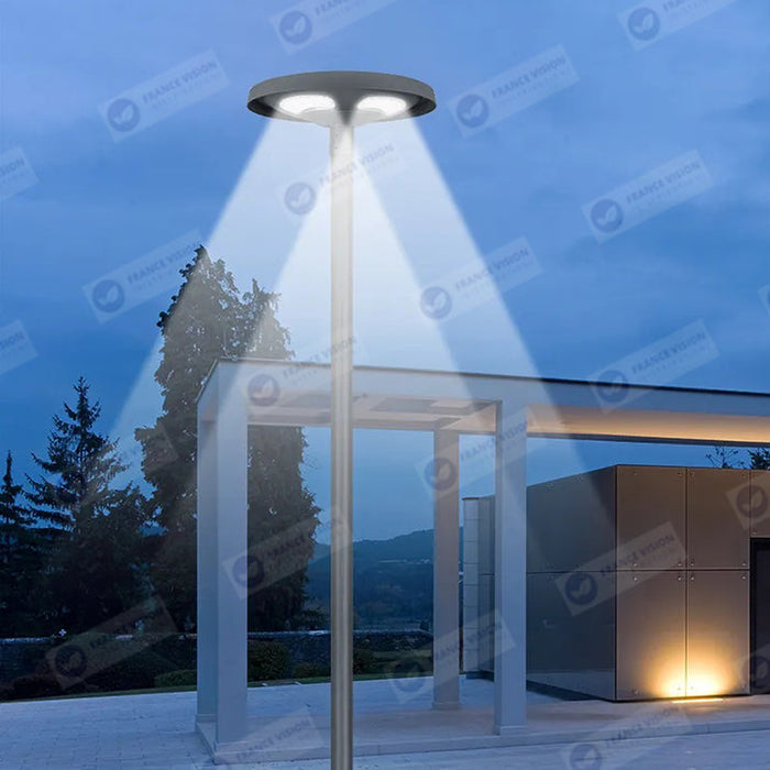 Lampe solaire pour extérieur - série OVNI FUTUR V2 - 1500 Watts - 3200 Lumens - Angle 360° - IP65 - 61 x 19 cm - Tube d'insertion 76 mm - Structure en aluminium - Capteur crépusculaire - Télécommande multifonctions - 4000k