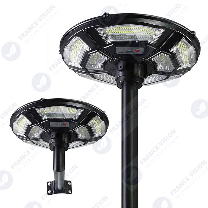 Lampe solaire pour extérieur - Série OVNI BASIC V2 - Rendu lumineux 150W - Angle 360° - IP65 - 55 x 15 cm - Tube d'insertion 60 / 76mm - Avec télécommande - Avec détecteur de mouvement - Avec capteur crépusculaire - 6000k